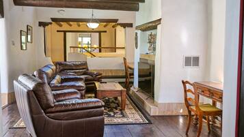 Smart TV, fireplace, books, printers