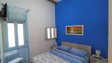 2 slaapkamers, een strijkplank/strijkijzer, reisbedje, gratis wifi