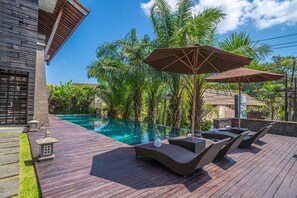 Outdoor pool, pool umbrellas, pool loungers