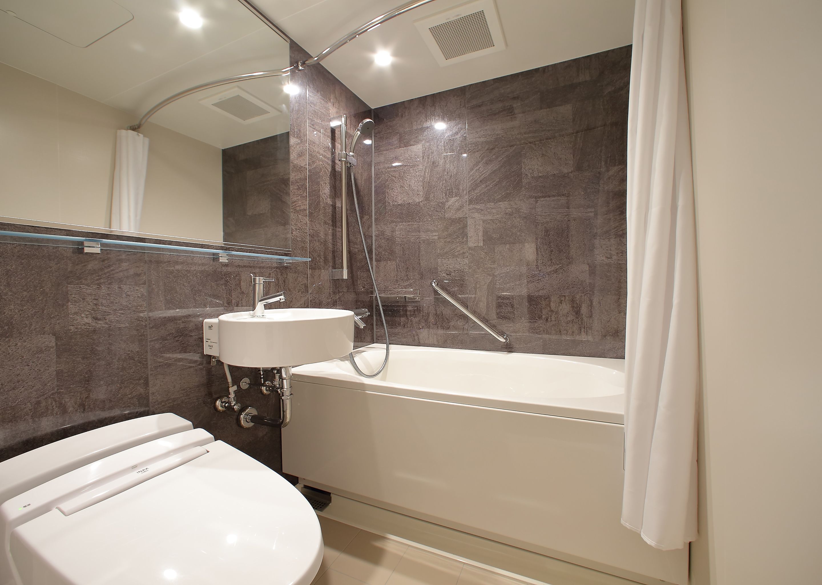 free toiletries, hair dryer, slippers, bidet