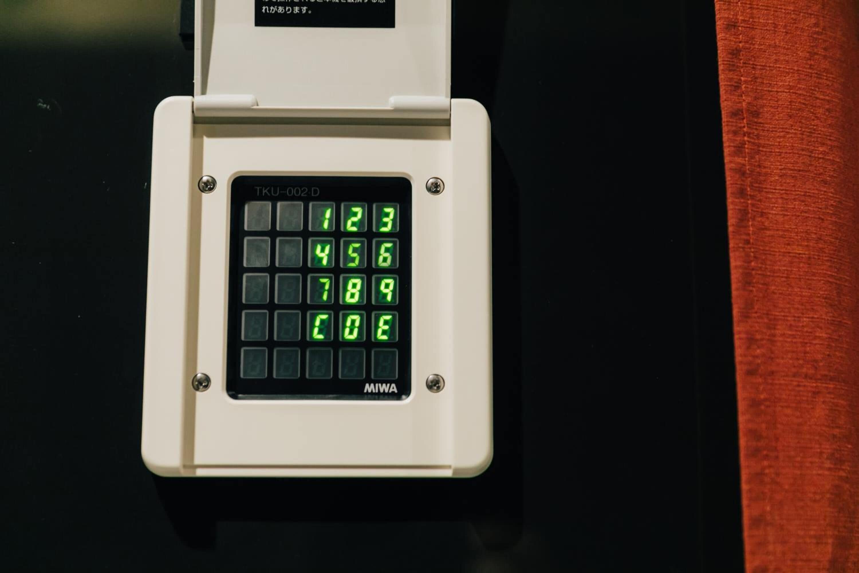 A keypad with a digital display.