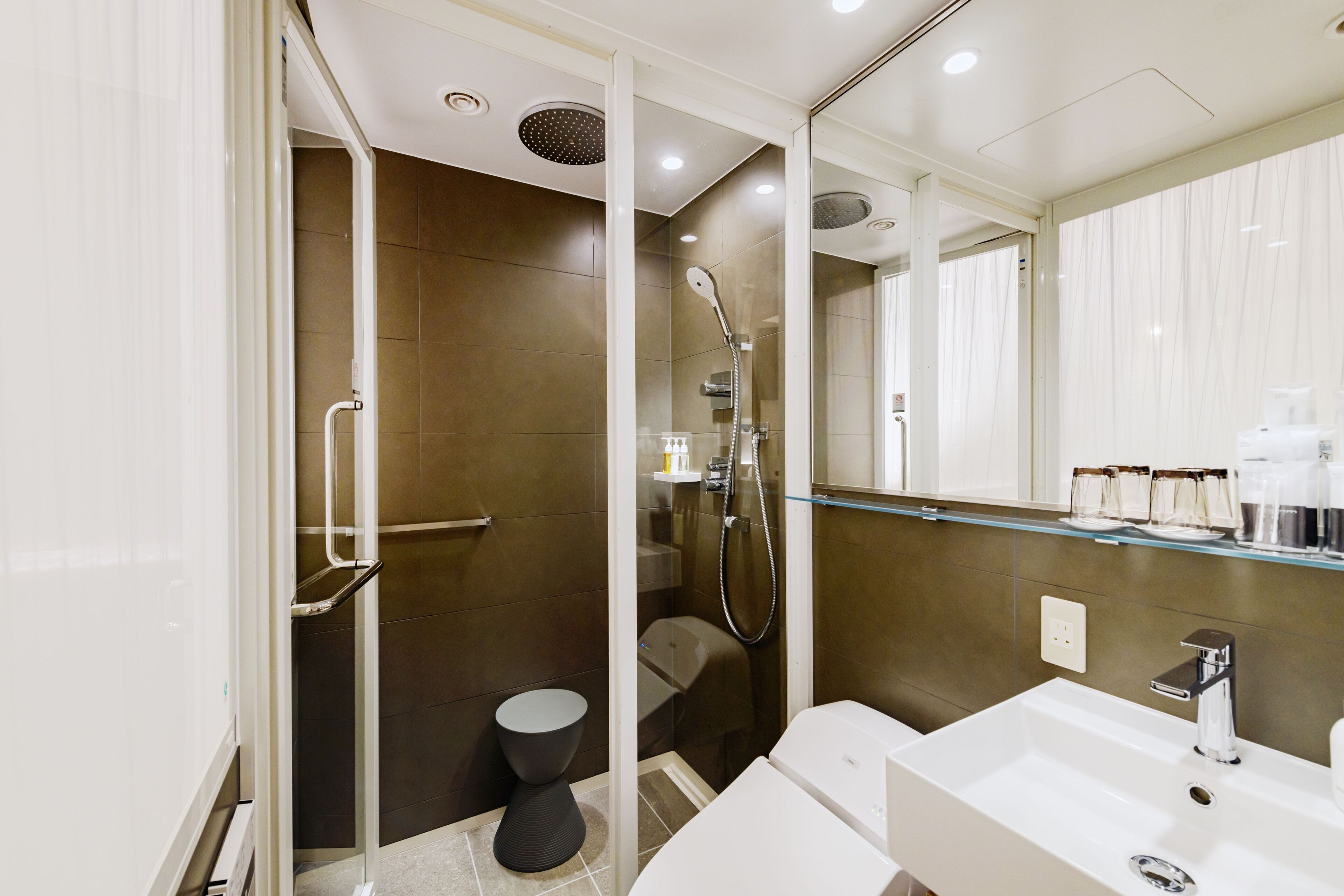 eco-friendly toiletries, hair dryer, slippers, bidet