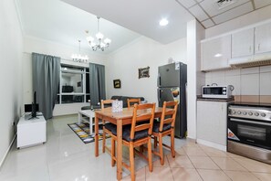 Standard Apartment, 1 Queen Bed, Lake View | In-room dining - City Nights - Lake City Tower (Dubai)