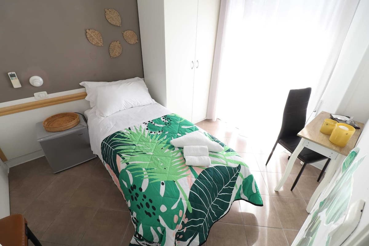 Desk, free WiFi, bed sheets