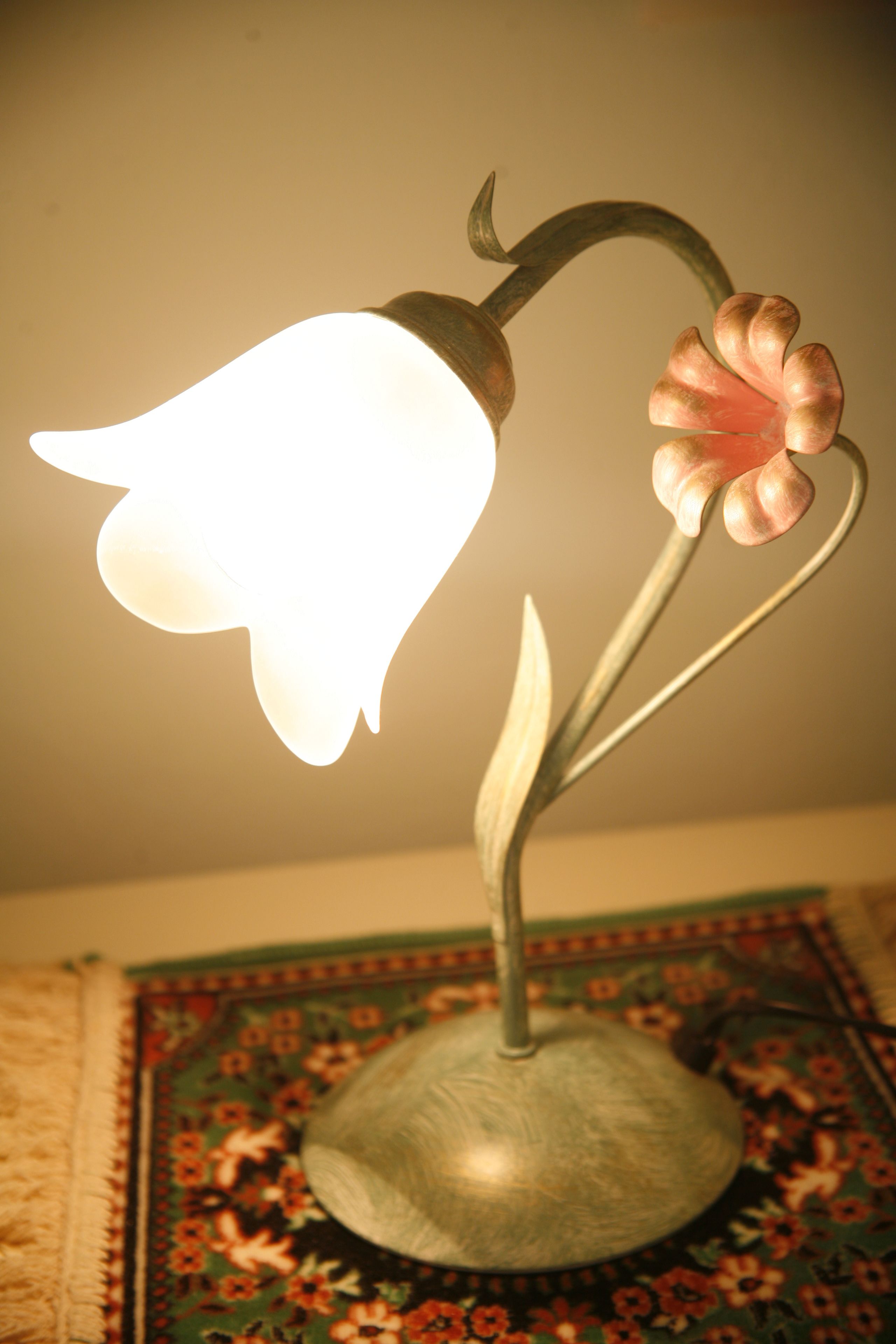 A table lamp with a floral design.