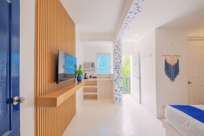 Habitación Premier | Cortinas blackout y ropa de cama 