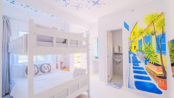 Habitación Premier | Cortinas blackout y ropa de cama
