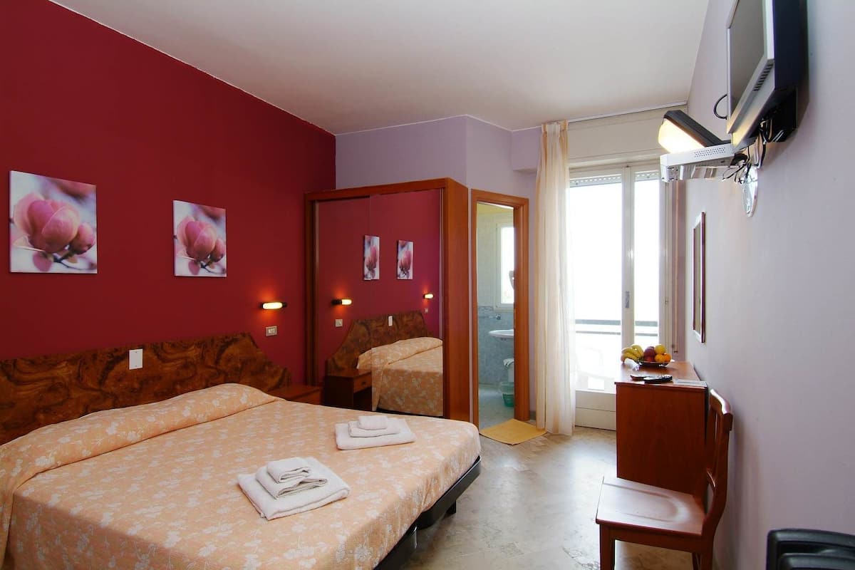 Habitación con 1 cama matrimonial o 2 individuales | Cunas gratuitas y wifi gratis