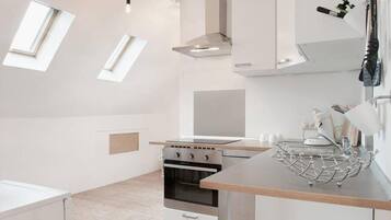 Fridge, stovetop, coffee/tea maker, electric kettle