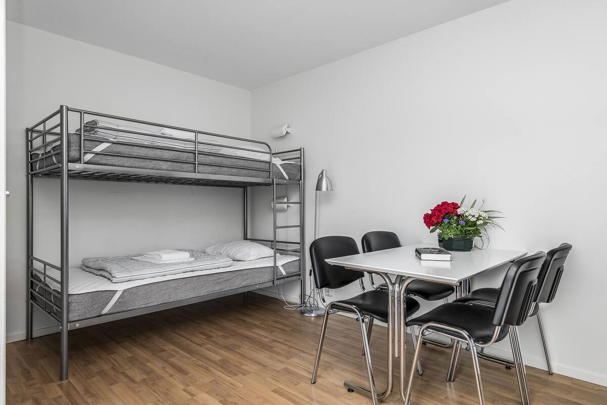 Desk, laptop workspace, blackout curtains, free WiFi