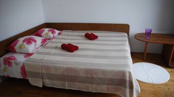 Habitación cuádruple superior | Área de sala de estar