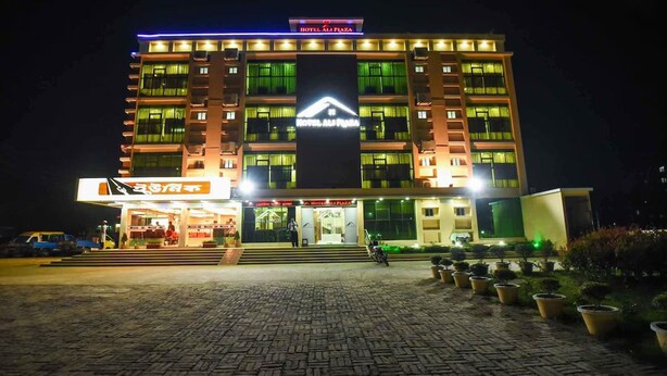 A multi-story hotel with a prominent sign reading "HOTEL ALI PLAZA". - Hotel Ali Plaza (Sylhet)