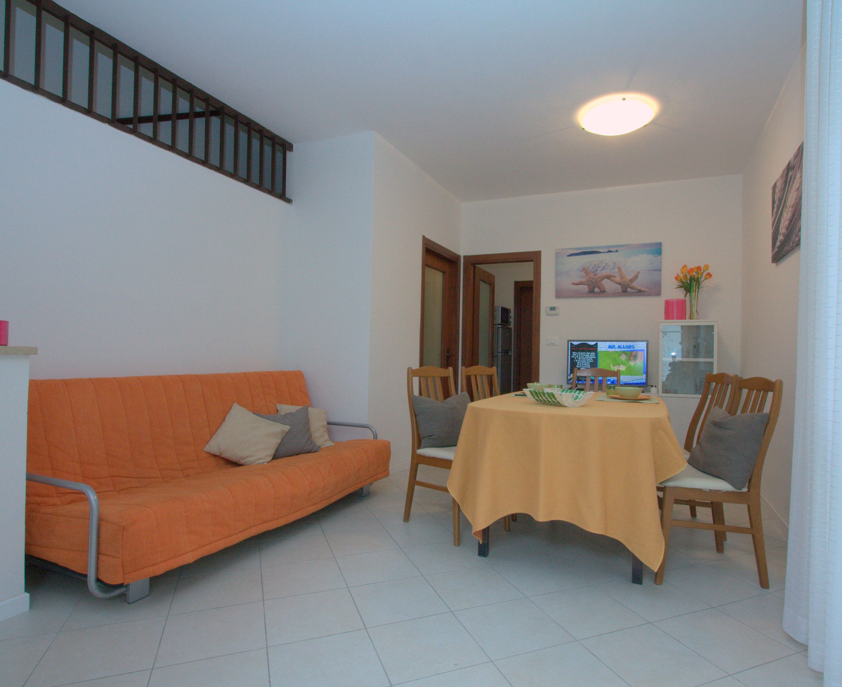 Apartment, 4 Bedrooms, Garden View | Living area | Flat-screen TV