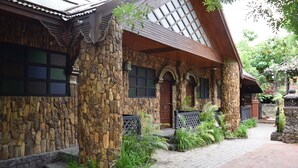 A traditional building with stone walls, wooden beams, and a tiled roof. - Bagan Central Hotel (Nyaung-U)