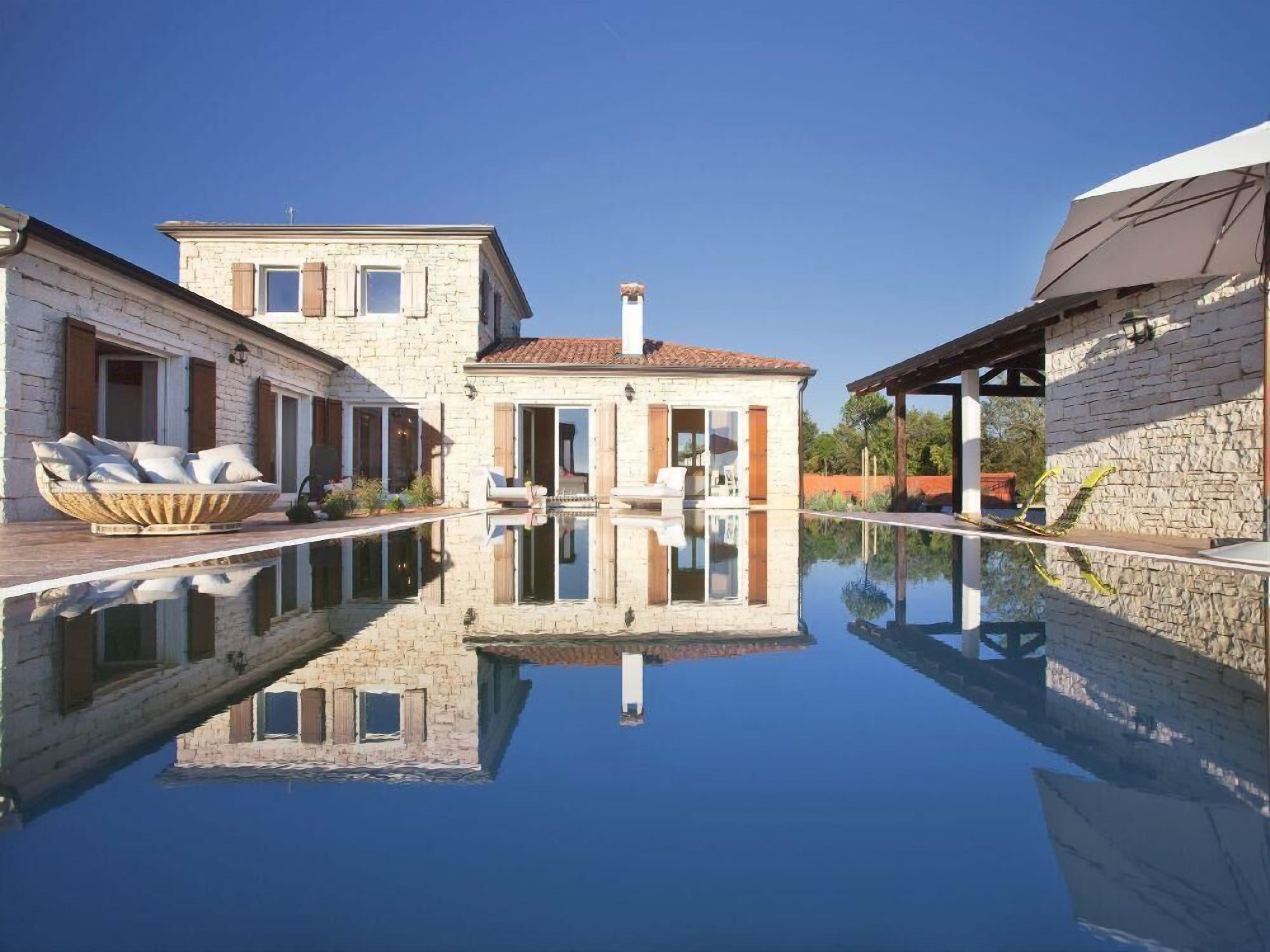 Villa, Multiple Beds | Pool | Seasonal outdoor pool, pool umbrellas, pool loungers