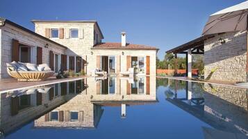 Villa, Multiple Beds | Pool | Seasonal outdoor pool, pool umbrellas, pool loungers