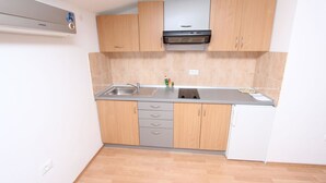 Apartment, 1 King Bed | Private kitchen | Espresso maker, fridge, stovetop, electric kettle - Apartments Orbanic (Rovinj)