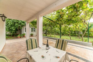 Apartment, Multiple Beds | Garden view