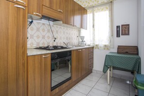 Apartment, Multiple Beds | Private kitchen