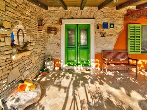 Villa, varias camas | Balcón