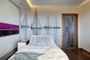 Apartamento Confort | Sistema de insonorización y tabla de planchar con plancha