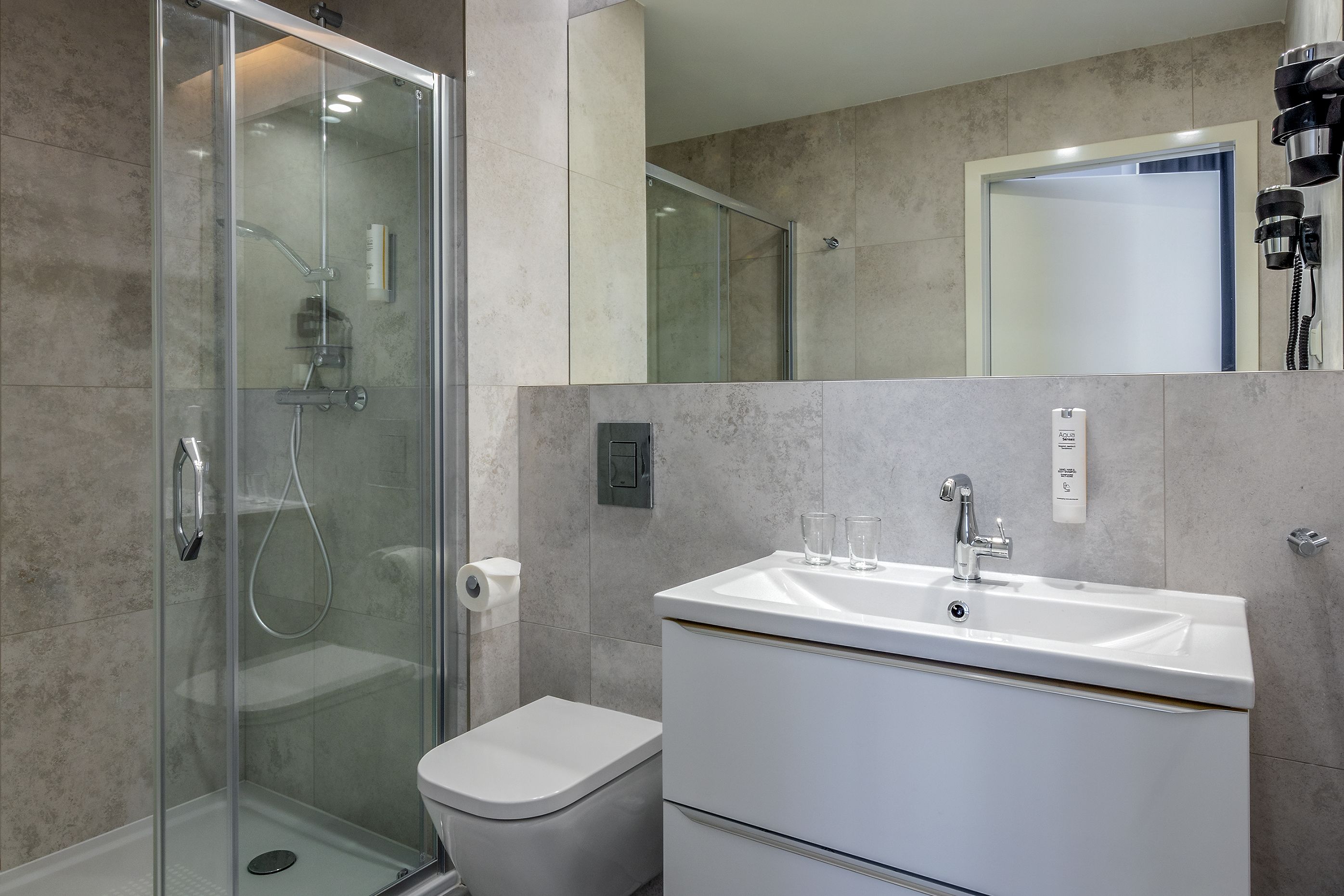 shower, rainfall showerhead, hair dryer, towels