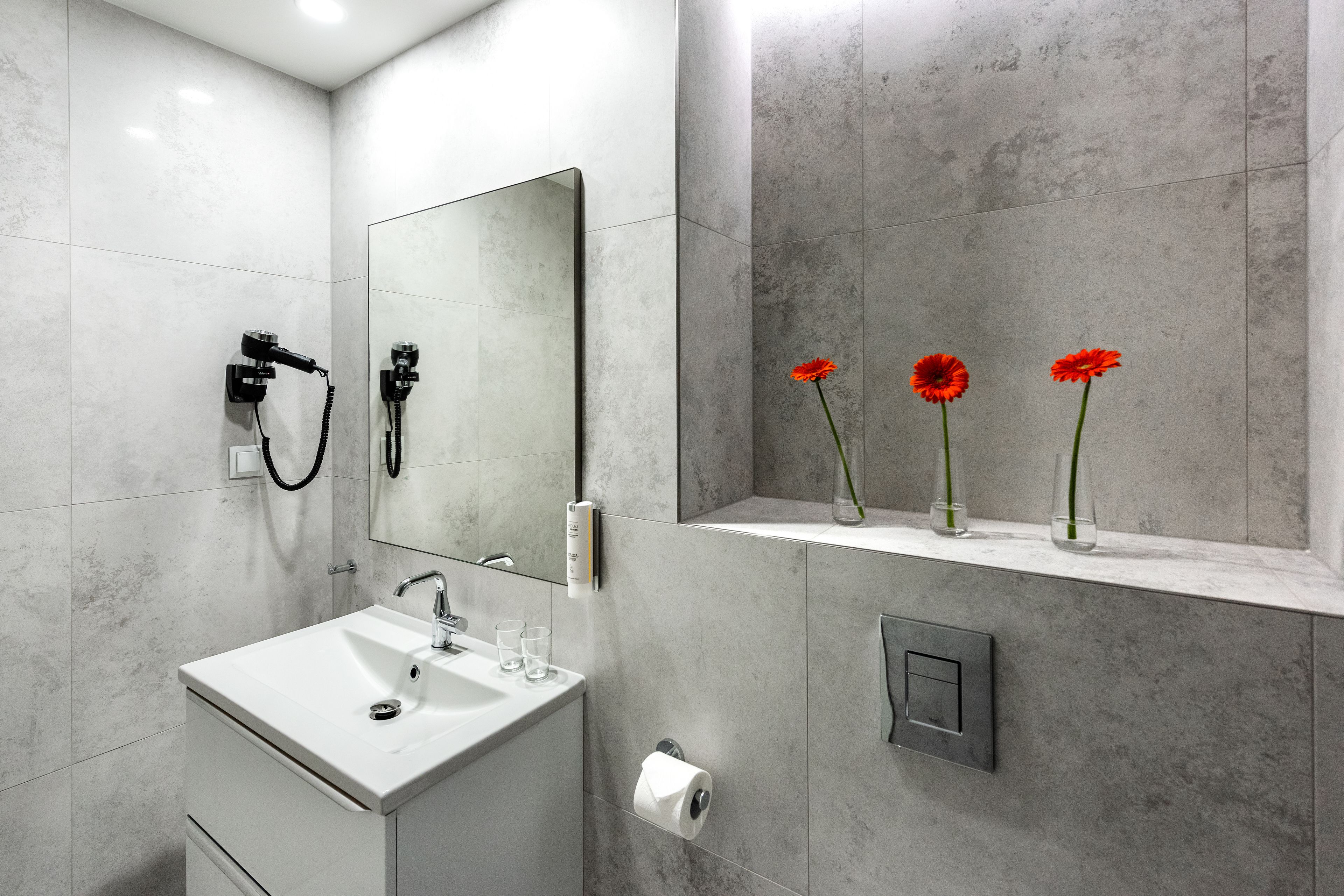 shower, rainfall showerhead, hair dryer, towels