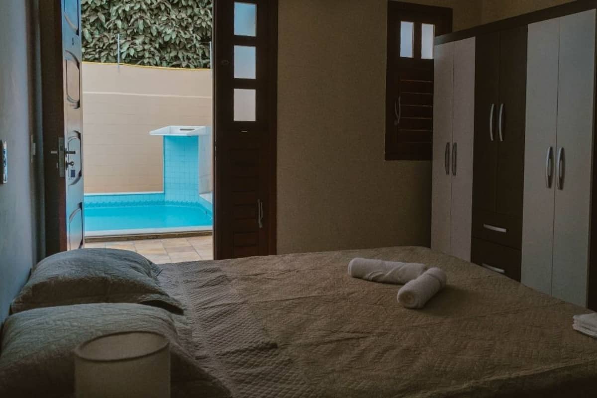 Frigobar, cortinas blackout, Wi-Fi de cortesia, roupa de cama