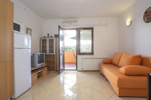 Apartment, 1 Doppelbett und Schlafsofa | Wohnzimmer | Fernseher