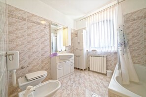Apartment, Multiple Beds | Bathroom | Shower, hair dryer, towels, soap - Apartments Rudan (Pula)