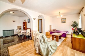 Apartment, Multiple Beds | Living room | 65-cm TV with satellite channels - Apartments Volte (Rovinj)