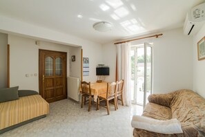Apartment, 1 Double Bed | Living room | TV