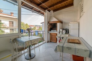 Apartamento, 1 cama de casal e sofá-cama | Cozinha privada | Cooktop