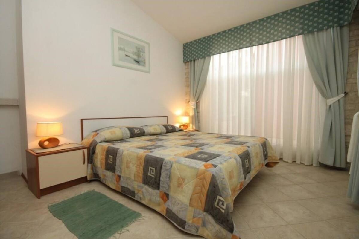 Appartement, Plusieurs lits | Lit de bébé (supplément), accès au Wi-Fi (inclus), literie fournie