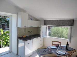 Apartment, 1 Double Bed | Private kitchen | Stovetop, cookware/dishes/utensils - Apartments Percan Krnica (Marcana)