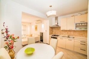 Apartamento, várias camas | Comodidades da propriedade