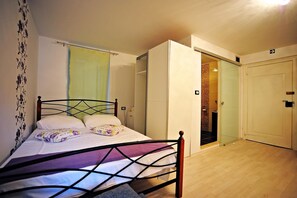 Departamento, 1 cama matrimonial y sofá cama | Cocina privada | Parrilla de estufa y utensilios de cocina 