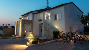 A modern two-story house with a stone facade, a staircase, and a satellite dish. - Istrian Villa Lavanda (Kanfanar)
