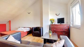 Apartment, Multiple Beds | Private kitchen | Fridge, stovetop, coffee/tea maker, toaster