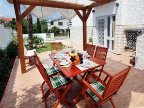 Appartement, plusieurs lits | Terrasse/Patio