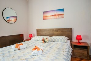 Appartement, plusieurs lits | Wi-Fi gratuit, draps fournis