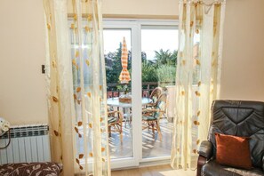 Appartement, plusieurs lits | Balcon