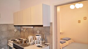 Departamento, varias camas | Cocina privada