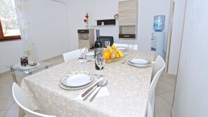 Appartement, plusieurs lits | Cuisine privée