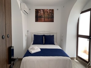 Habitación familiar (2pax) | Wifi gratis y ropa de cama 
