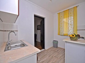 Apartment, Multiple Beds | Private kitchen