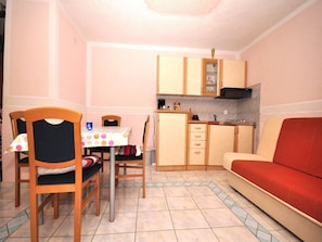 Apartment, Multiple Beds | Living room | TV