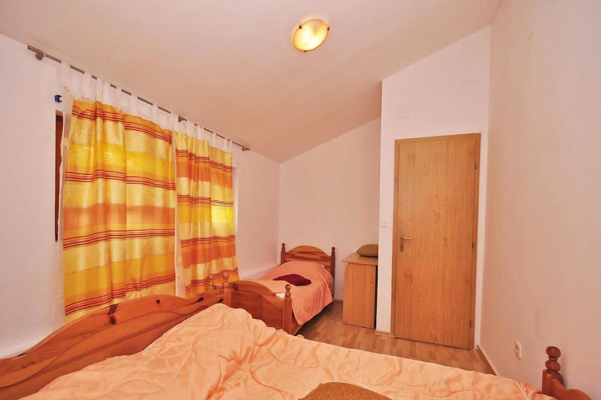 Appartement, Plusieurs lits | Accès au Wi-Fi (inclus), literie fournie