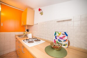 Apartamento, 1 cama de casal e sofá-cama | Cozinha privada