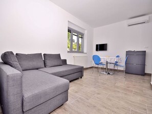Apartment, Mehrere Betten | Wohnzimmer